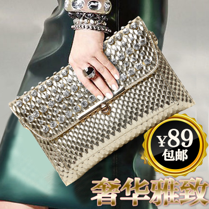 large gold clutch bag