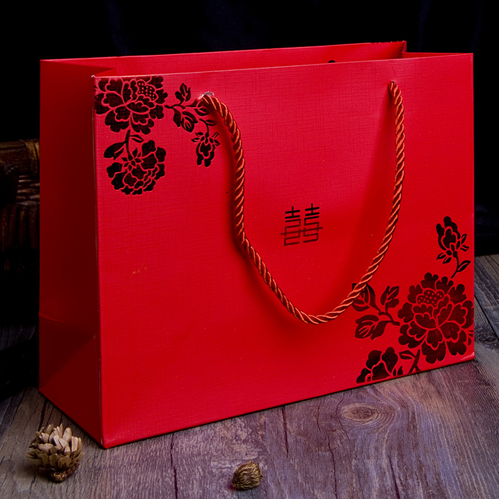 red and gold gift bags