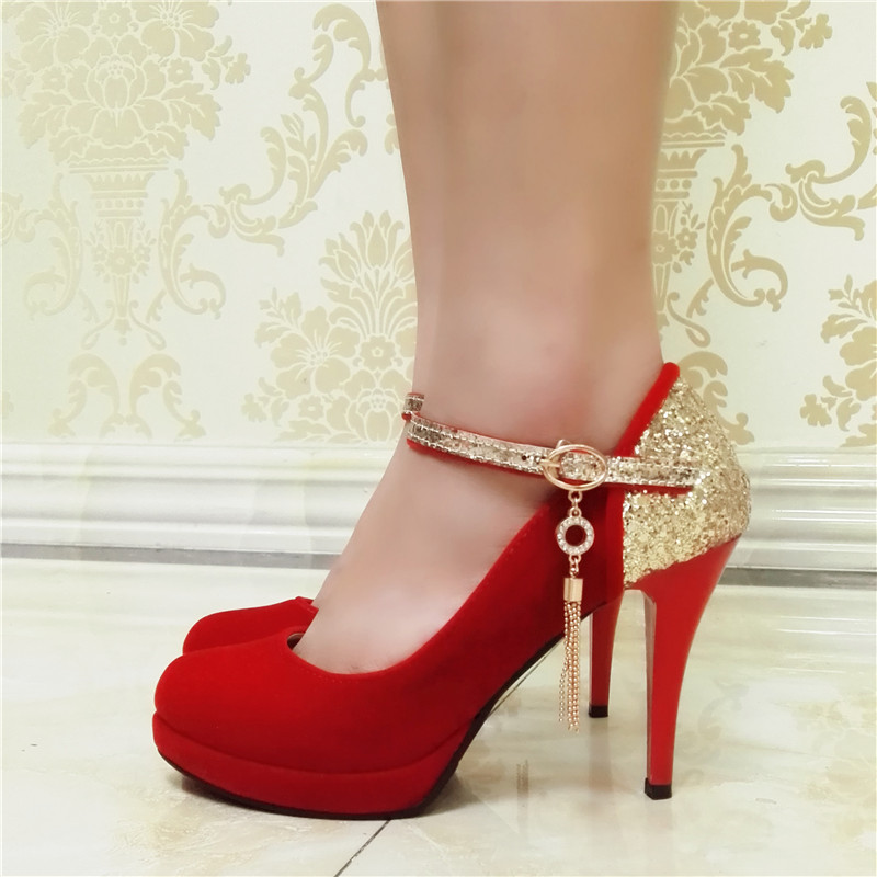 red shoes with gold heels